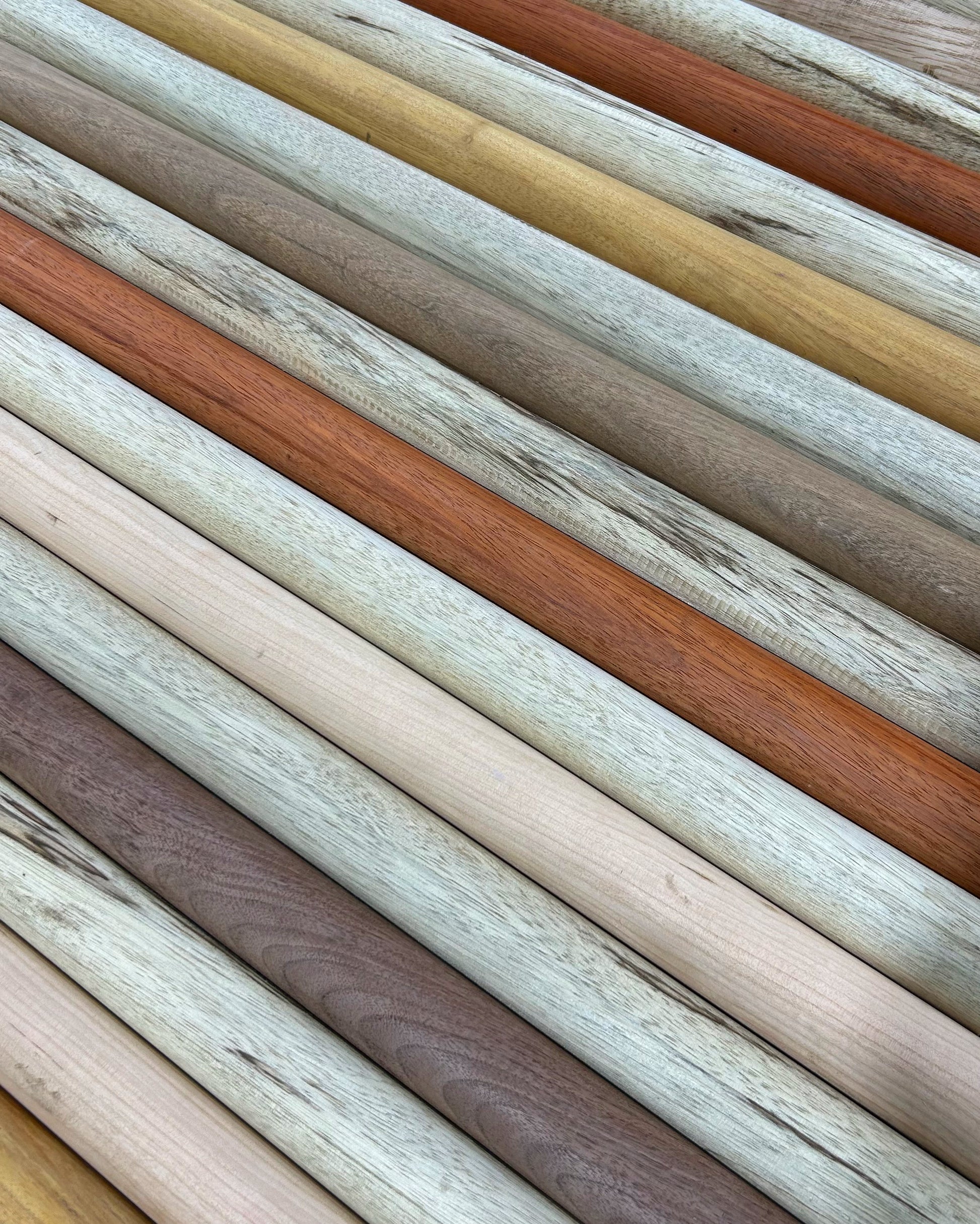 A selection of hardwood dowels in various shades and colors. Hardwood dowels for woodworking projects. Variety of species including Black Walnut, Cherry, Maple, Black Limba, Padauk, Canarywood, and many more.
