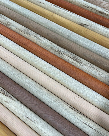 A selection of hardwood dowels in various shades and colors. Hardwood dowels for woodworking projects. Variety of species including Black Walnut, Cherry, Maple, Black Limba, Padauk, Canarywood, and many more.